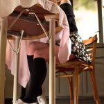 Blonde cutie Ella Nova lifts her flowered skirt up & flashes her muff on a bed