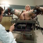 Kinky nurse fists & fucks blonde in bondage Ash Hollywood's vulnerable pussy