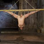 Tied-up Latina Kristina Rose getting clamped while in rope bondage suspension