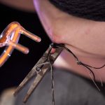 Submissive brunette is tortured with electro devices by a kinky female